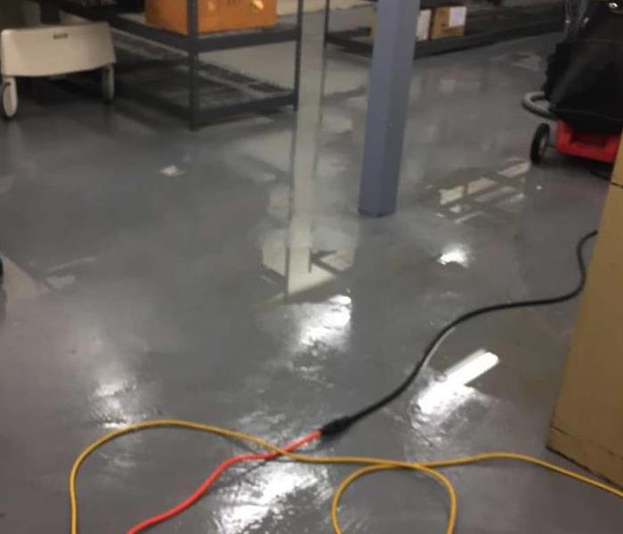 standing water on linoleum floor