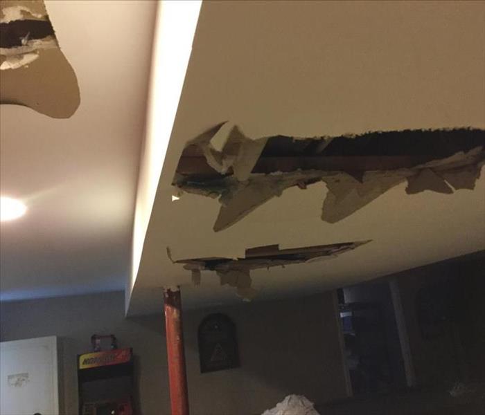 storm damage caused the ceiling to collapse in parts of this meriden home
