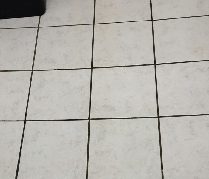 clean tile floor after cleanup of biohazard