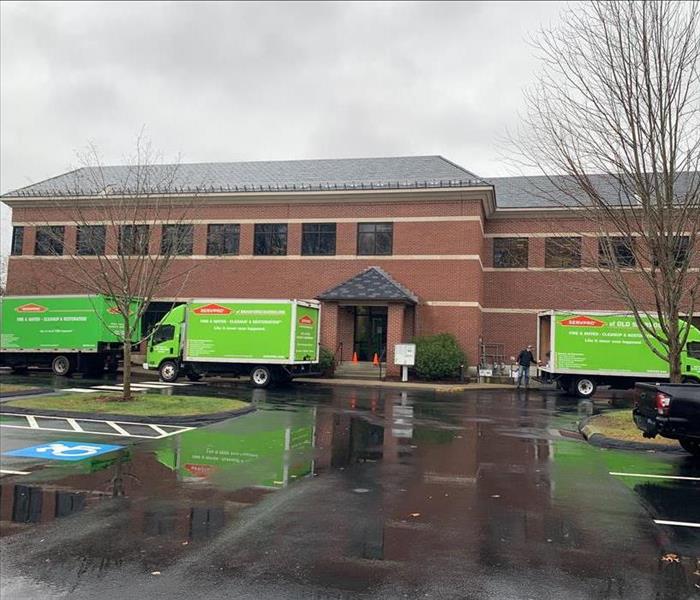 SERVPRO trucks in front of a commercial building